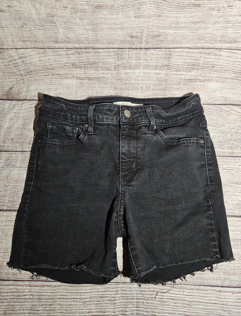 Levi's 711 black skinny cut off jean shorts